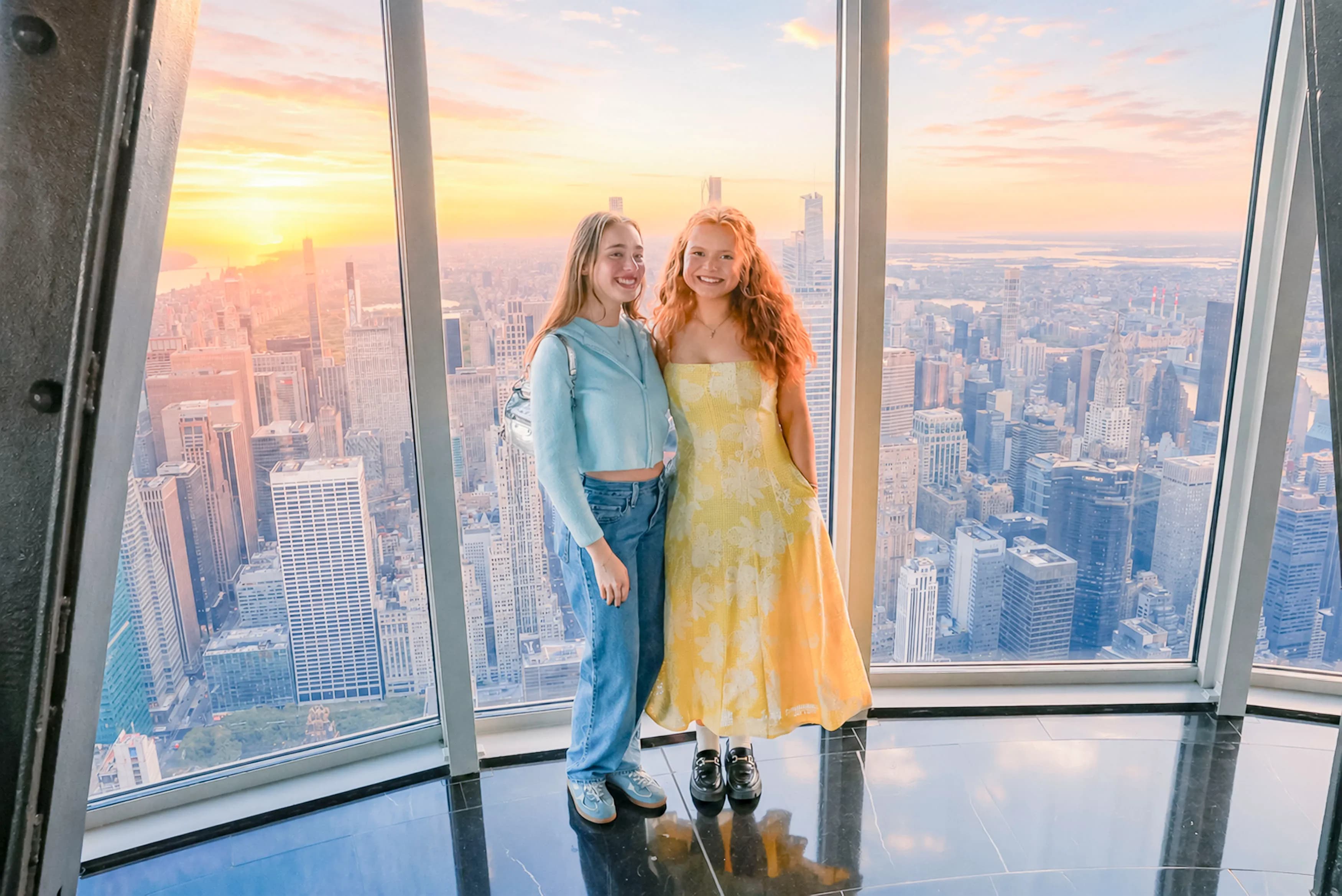 Friends taking picture on the 102nd Floor Observation Deck of the Empire State Building
