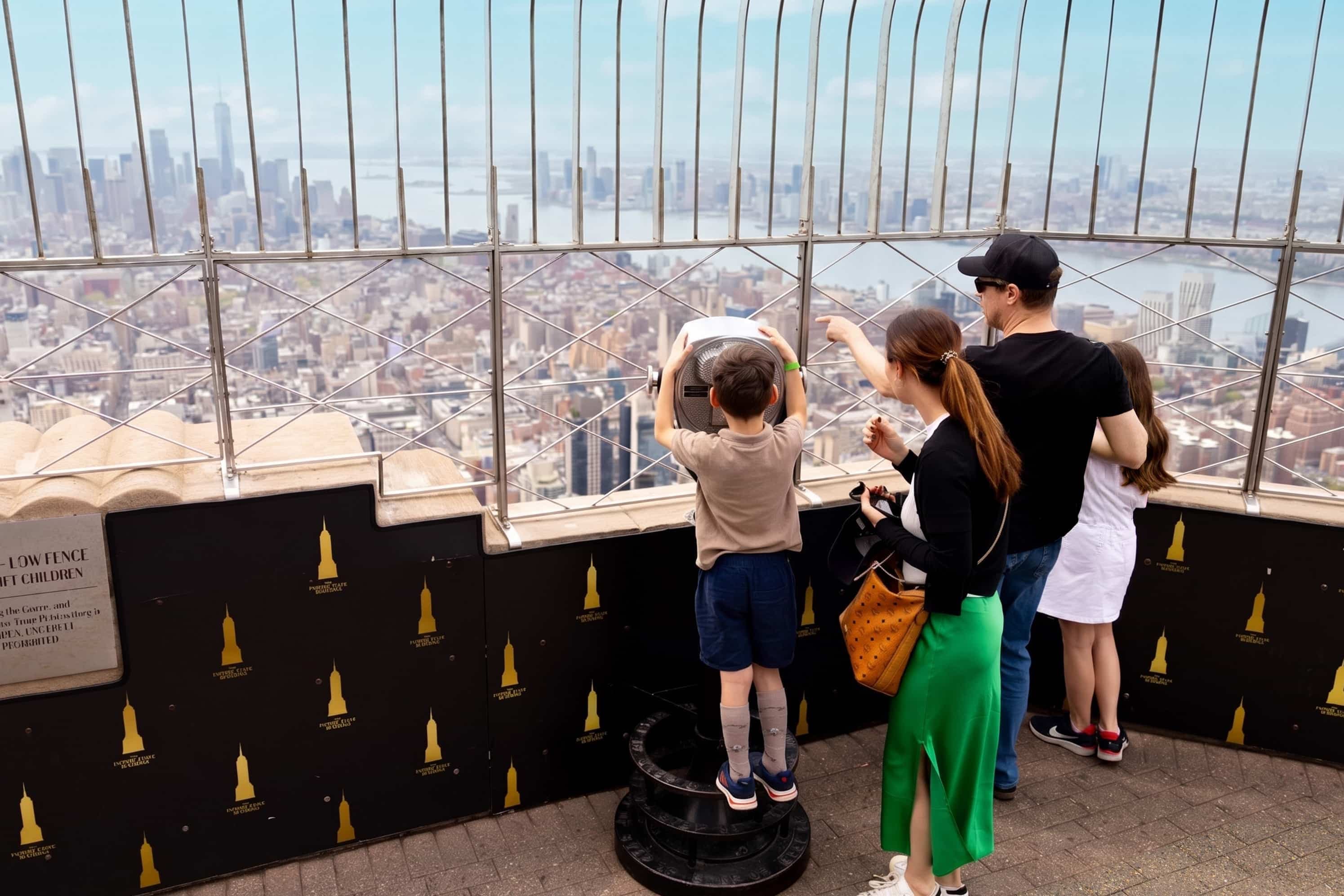 Family looking into view of Manhattan