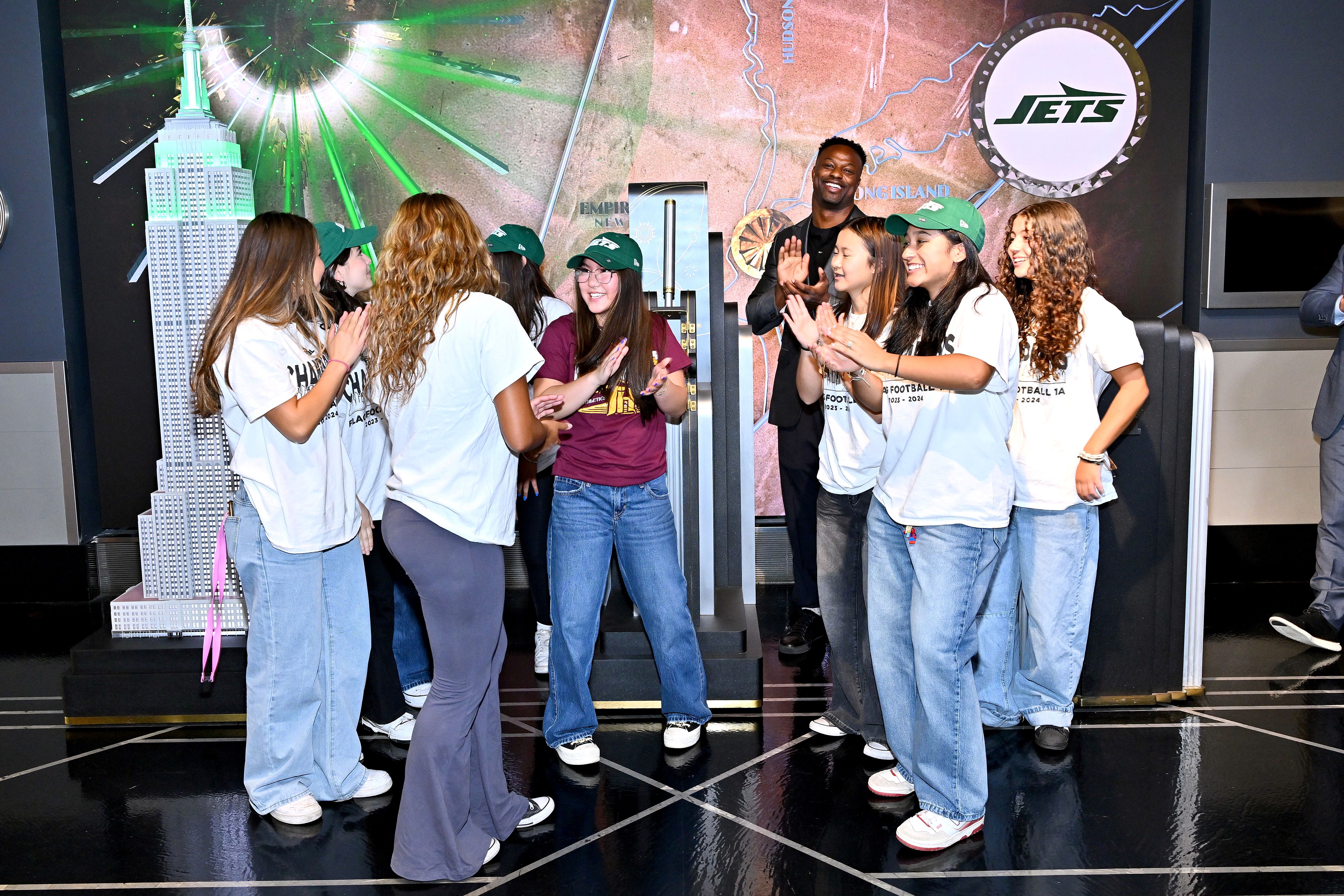 Bart Scott and the Townsend Harris Girls Flag Football Team of Queens light ESB