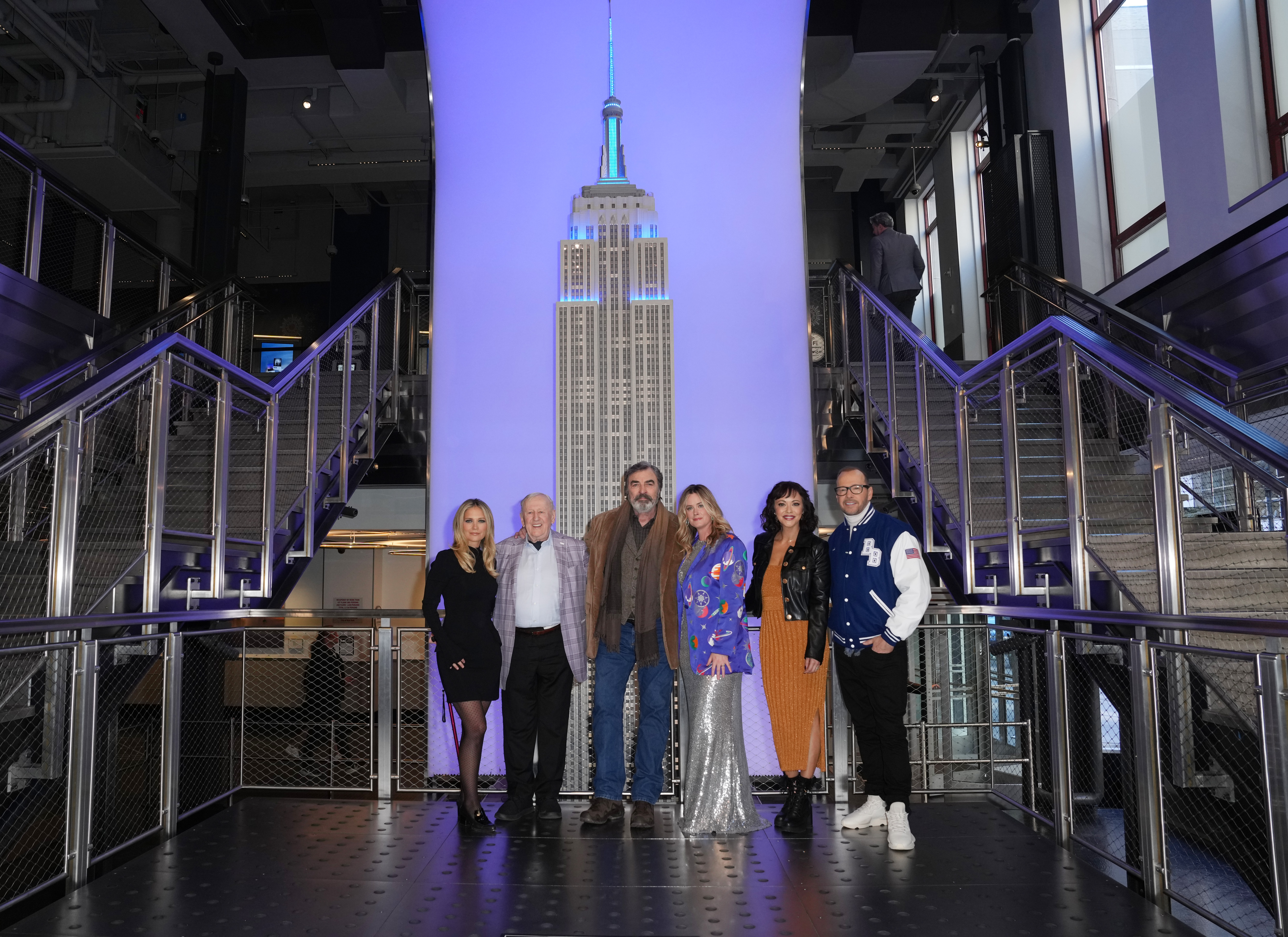 The "Blue Bloods" cast with the ESB model