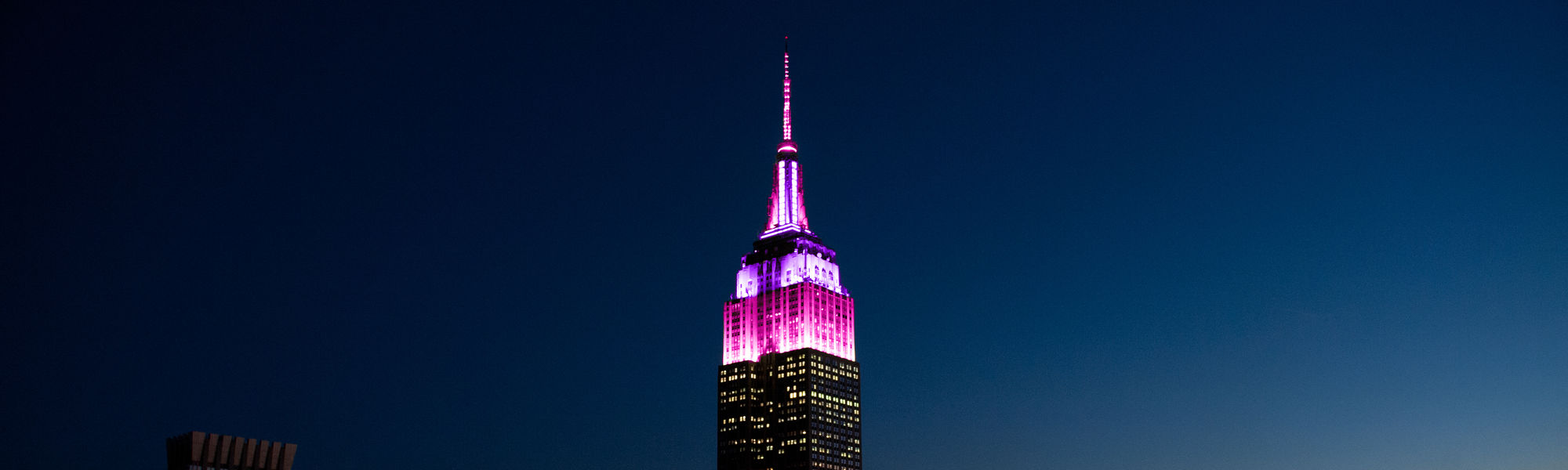 ESB lit in pink and purple for Hoda & Jenna