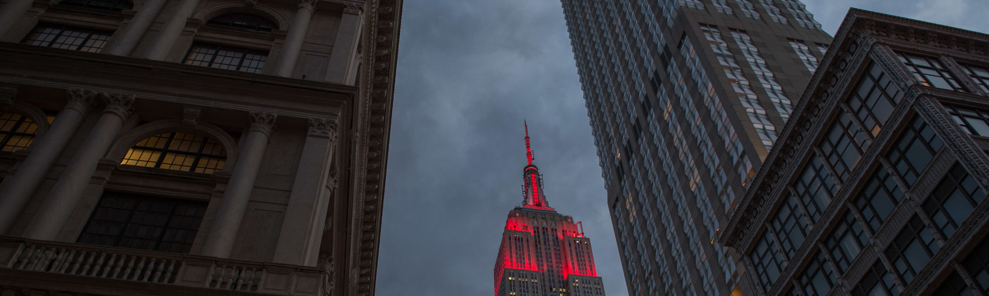 ESB lit in red for Hispanic Heritage Month