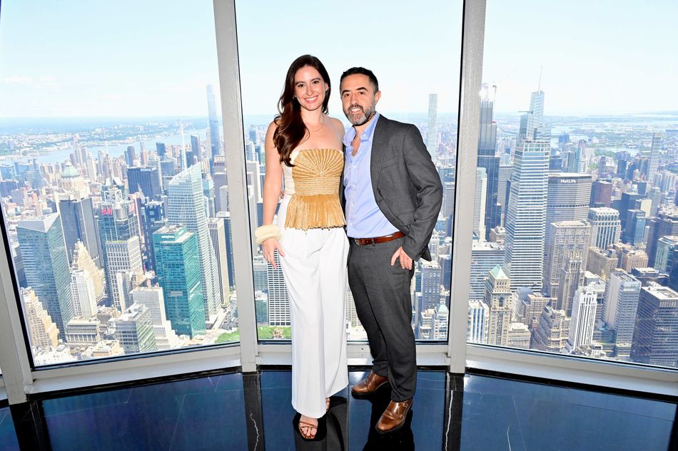 Taliana Vargas and the Consul General Andres Mejia on the 102nd Floor