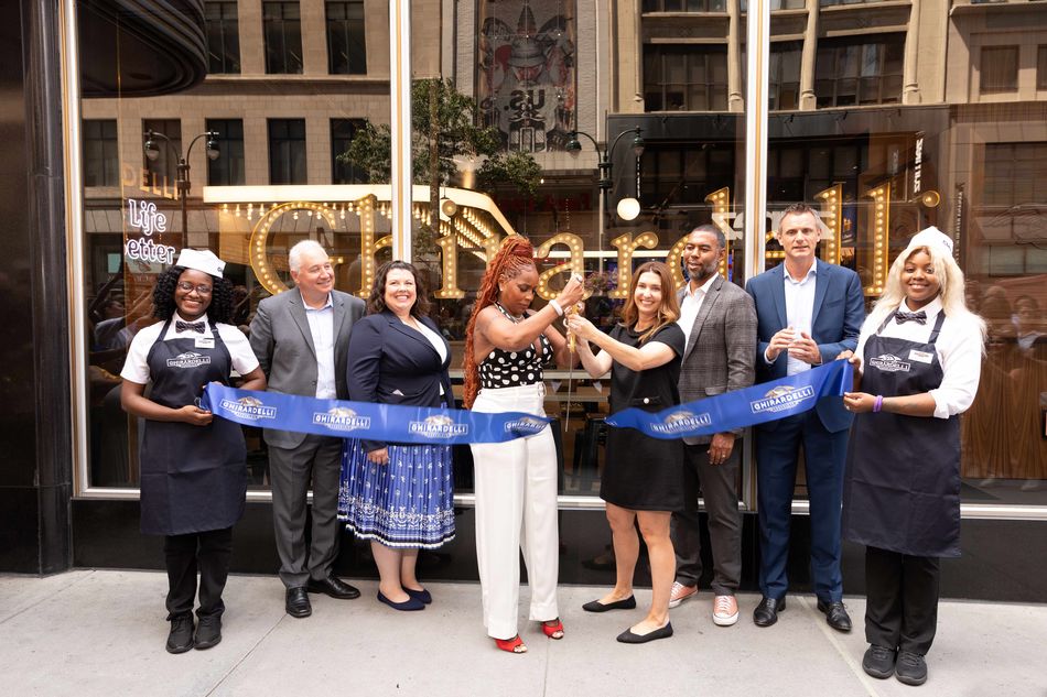 Mary J Blige cuts the ceremonial ribbon at the new Ghirardelli store