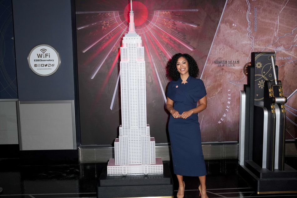 Shirleen Allicot with a model of the Empire State Building