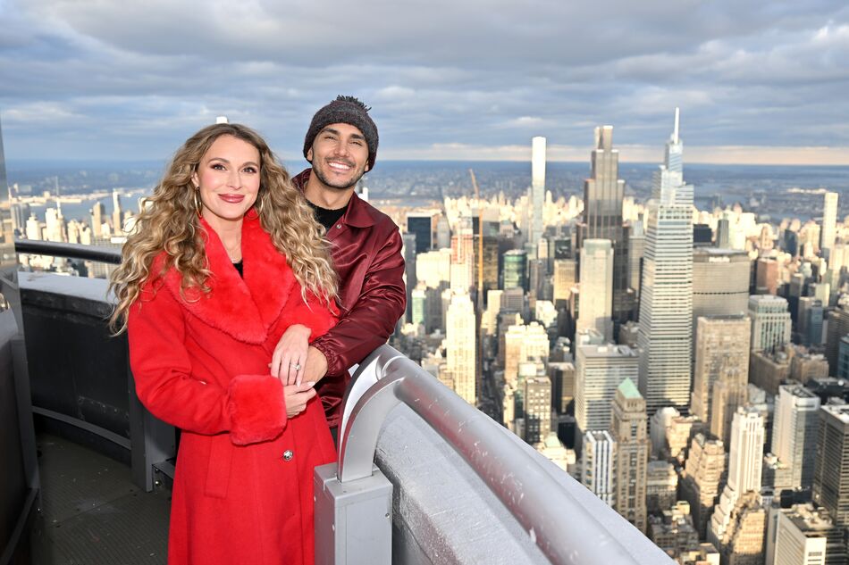 Carlos and Alexa PenaVega on the 103rd floor