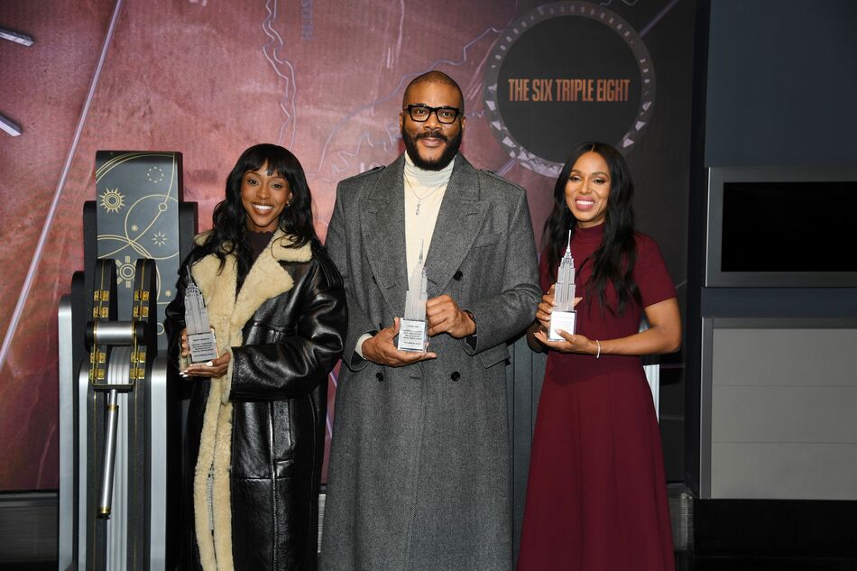 Ebony Obsidian, Kerry Washington, and Tyler Perry with building models