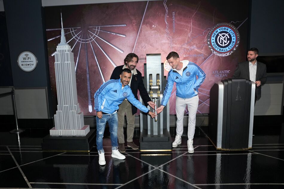 Andrea Pirlo, Maxi Moralez, and Matt Freese light the Empire State Building