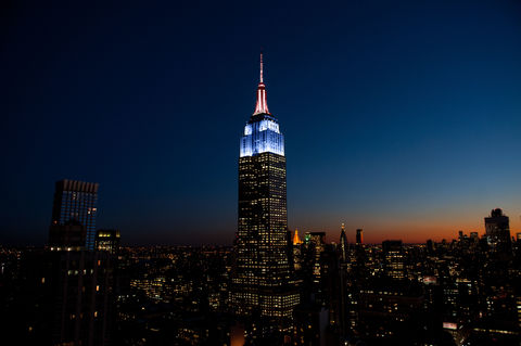 The Empire State Building lit in rose quartz and serenity