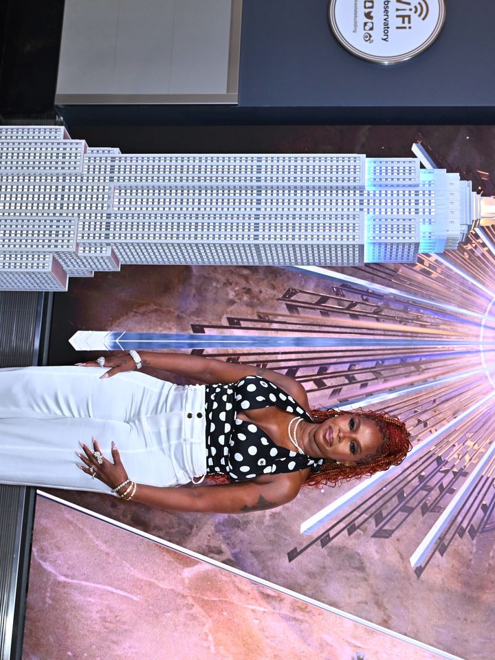 Mary J Blige poses with the Empire State Building model